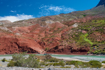 River with red rocks