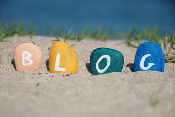 blog word painted over some pebbles