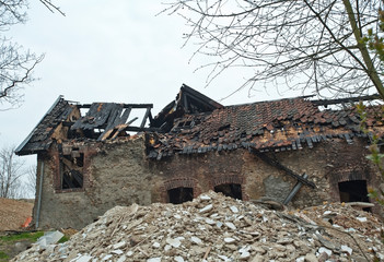Burnt and collapsed house