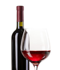 Bottle of great wine and wineglass isolated on white