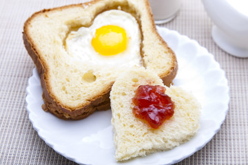 Breakfast - heart shaped bread and egg