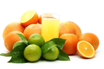 Ripe oranges , green lime and juice.