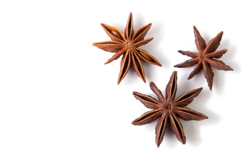 Three anise stars isolated on white background, copyspace