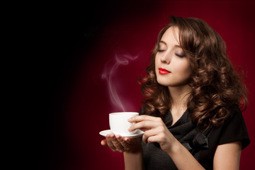 Beautiful woman with cup of tea