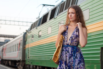 Woman waiting train on the platform