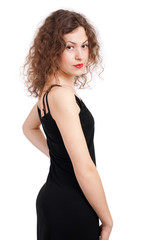 Fototapeta premium Portrait of beautiful woman in black dress on white background