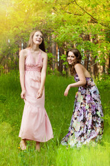 Fototapeta premium Young girls in the forest