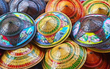 colorful rice straw hats - obrazy, fototapety, plakaty