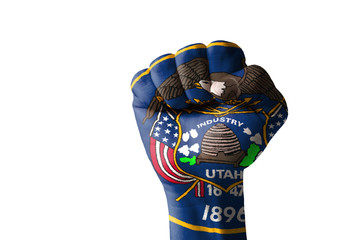Fist painted in colors of us state of utah flag