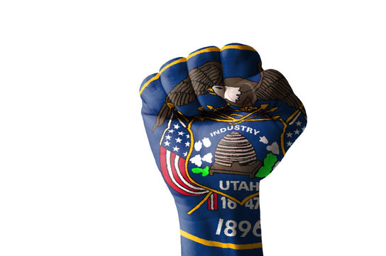 Fist painted in colors of us state of utah flag