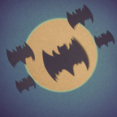 bat and full moon in Halloween day made by grunge recycle paper.