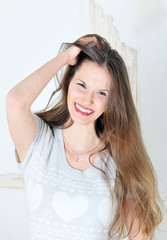 Fototapeta premium portrait of beautiful young brunette smiling
