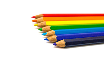 Rainbow colorful pencils on white