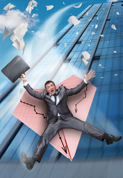 Businessman falling on paper airplane
