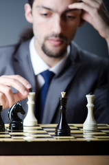 Chess player playing his game