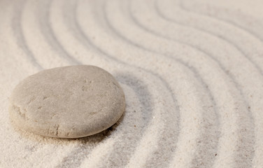 Fototapeta na wymiar galets simplicité sur sable fin