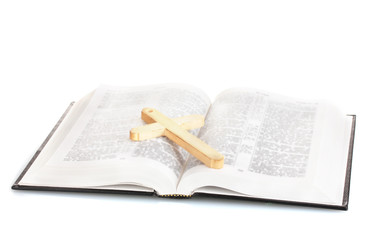 Obraz premium Russian bible and wooden cross isolated on white