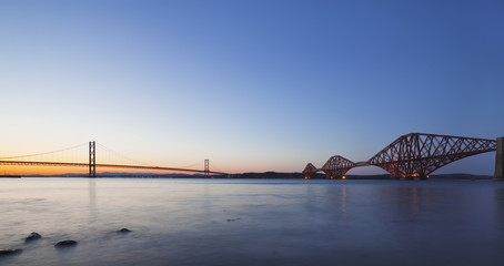 The Forth Road and Rail Bridges at night dusk