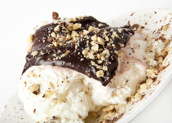 Vanilla ice cream with chocolate and nuts