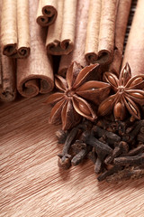 Herbs and Spices over wooden background