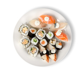 Sushi and rolls in a plate isolated