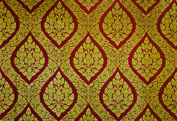 Traditional Thai floral art on temple wall