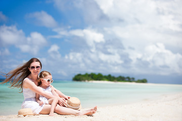 Mother and daughter at tropical beach