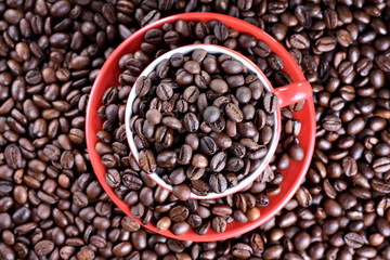 Cup full of coffee beans