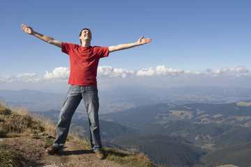 Happy man on the mountain