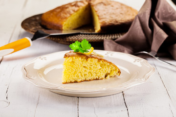 Lemon Sponge Cake on white wooden table