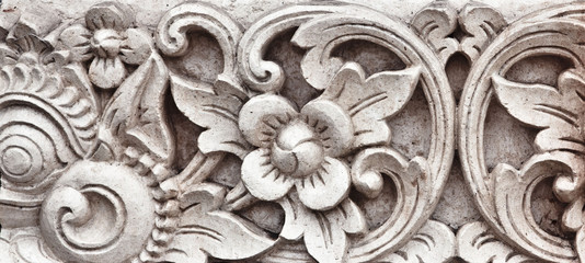 carving stone with flower motive