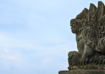 Fototapeta na wymiar Traditional Balinese God statue, at Ocean, Bali, Indonesia.