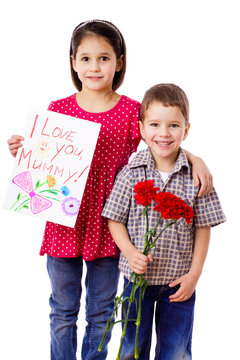 Two kids with greetings for mum