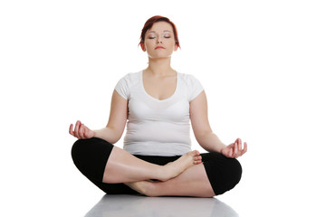 Young woman during yoga exercise