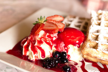 Belgian waffle with strawberry ice cream