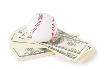 Baseball on top of stacks of cash, isolated on white