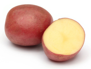 Sliced red potatoes over white background