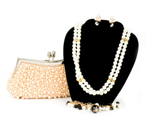 Fashionable handbag and pearl jewelry