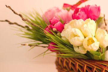 Easter spring flowers in basket
