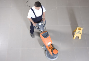 cleaning floor with machine