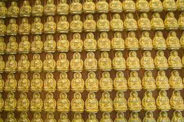 Gold Buddha wall , chinese temple ,thailand