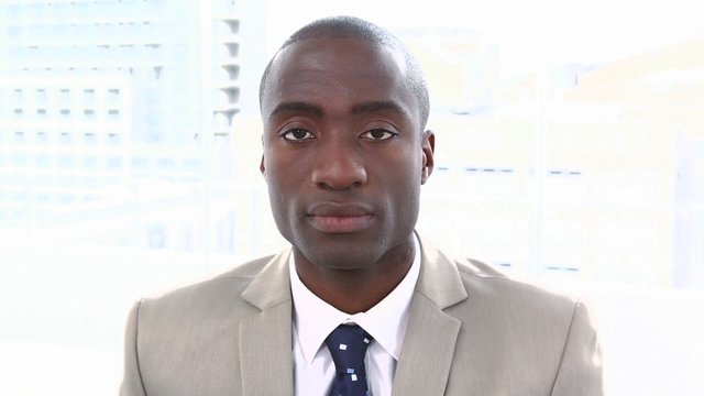 Portrait of an unsmiling businessman