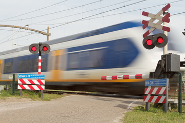 Train at level crossing