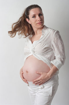 Portrait of a cute pregnant woman