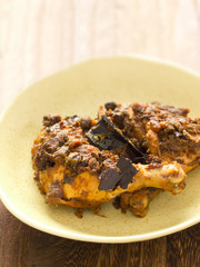 close up of a bowl of royal chicken yogurt curry