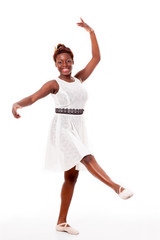 Young african-american ballet dancer in developpé