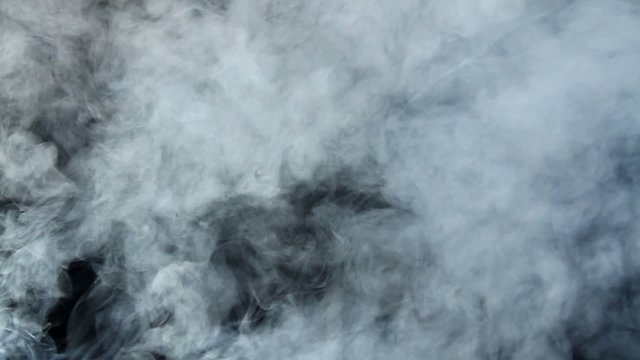 Thick smoke on black background