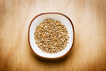 coriander on wood table