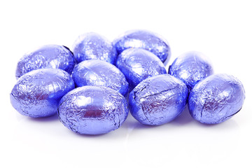 Purple chocolate easter eggs in closeup