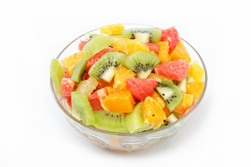 Fresh fruits salad on white background
